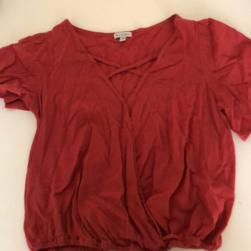 Flowy and cute shirt!! Only worn a few times!